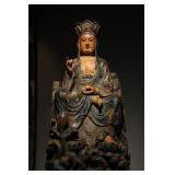 A SEATED STATUE OF THE BODHISATTVA DIZANG IN...