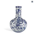 A BLUE AND WHITE PORCELAIN VASE WITH NINE...