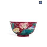 A BOWL MADE BY EMPEROR KANGXI WITH A CRIMSON...