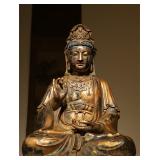 A GILDED BRONZE STATUE OF GUANYIN BODHISATTVA...