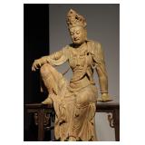 A MING DYNASTY WOODCARVING OF THE FREE AND EASY...