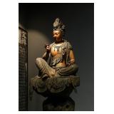 THE SONG DYNASTY GILDED AND PAINTED STATUE OF...