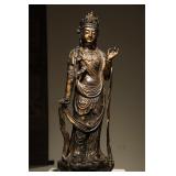 A GILDED BRONZE STATUE OF BODHISATTVA...
