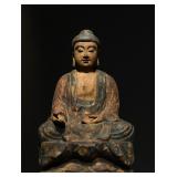 A WOODEN STATUE OF SAKYAMUNI BUDDHA FROM THE...