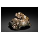 BRONZE WITH SILVER INLAID TURQUOISE RECLINING...