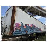Weathered Semi-Trailer Storage Unit with Graffiti