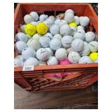 Crate of golf balls