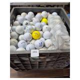 Crate of golf balls