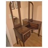 Antique vanity with trifold mirror