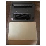 Electric Typewriter & Ledger Paper