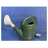 Green Plastic Watering Can with White Rose