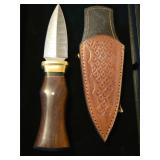 Handmade double blade Damascus knife.