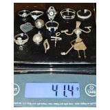 42 grams of sterling silver pendants and rings