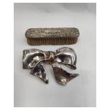 2 Str. Items: Bow Brooch & Brush
