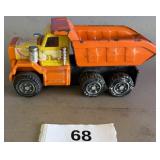 1970s vintage press, steel dump truck toy