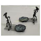 cast iron brutalist style hare candle holders pair