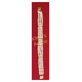 14K yellow gold triple strand akoya pearl bracelet