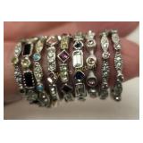 lot of 9 stack able rings swarovski & 925 too!