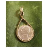 vtg gold plated ? 1972 nickel pendant