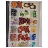 jewelers trays full beads, gold filled