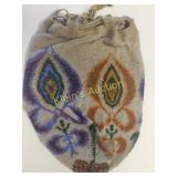 Victorian era hand-beaded drawstring bag, featuri