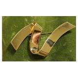 abstract gold tone ribbon brooch monet