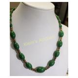 green bakelite? w/ gold tone spacers necklace