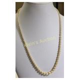 14K white gold clasp w/ graduating pearls necklace