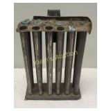 antique brass? metal 12 hole candle mold