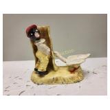cast iron figurine vintage boy with goose