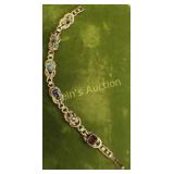 mid century multi gemstone bracelet goldette NY?