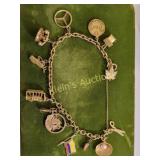 14K yellow gold charm bracelet Mercedes, cable car