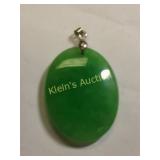 oval jade & 18k gp pendant 67.5 carats