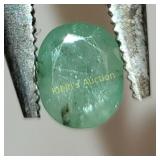 natural light green zambran ? emerald 2 carats