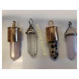 four hexagonal crystal point pendants