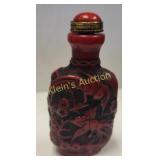 Chinese cinnabar or faux coral style snuff bottle