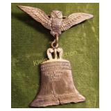 bronze flying owl freedom bell pin