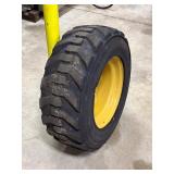 Lot #110 Caterpillar Rim & 10-16.5 NHS Tire