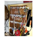 #1762 Ice Fishing Lures on display board 