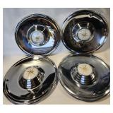 Lot 103: NOS Set of 4 Wheelcovers for the 1956-1957 Lincoln Premieres.