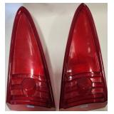 Lot 116:  NOS PAIR OF TAIL LAMP LENSES FOR THE 1957 LINCOLN PREMIERES.