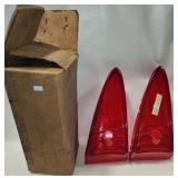 Lot 177: NOS PAIR OF RIGHT TAILLAMP LENSES FOR THE 1957 LINCOLNS!