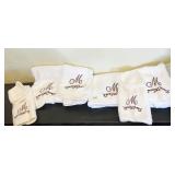 4 BATH AND 4 WASH CLOTHES AND 2 MONOGRAMED "M"