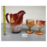 RED ORANGE AND WHITE PITCHER WITH TWO GOBLETS
