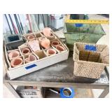 GROUP OF METAL, WICKER, AND TERRA COTTA PLANTERS