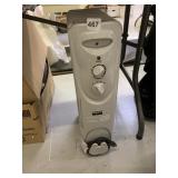 OIL FILLED HEATER BY DAYTON WITH ROLLERS