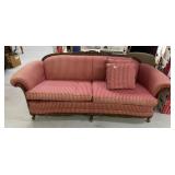BURGUNDY CARVED FOOT SOFA W/ WOOD FRAME AND