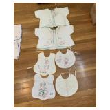 EMBROIDERED BABY CLOTHES AND BIBS