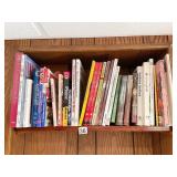 SHELF OF BOOKS & BABY PICTURES