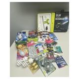 ASSORTED LIGHT BULBS AND SOLAR CHARGER NOT